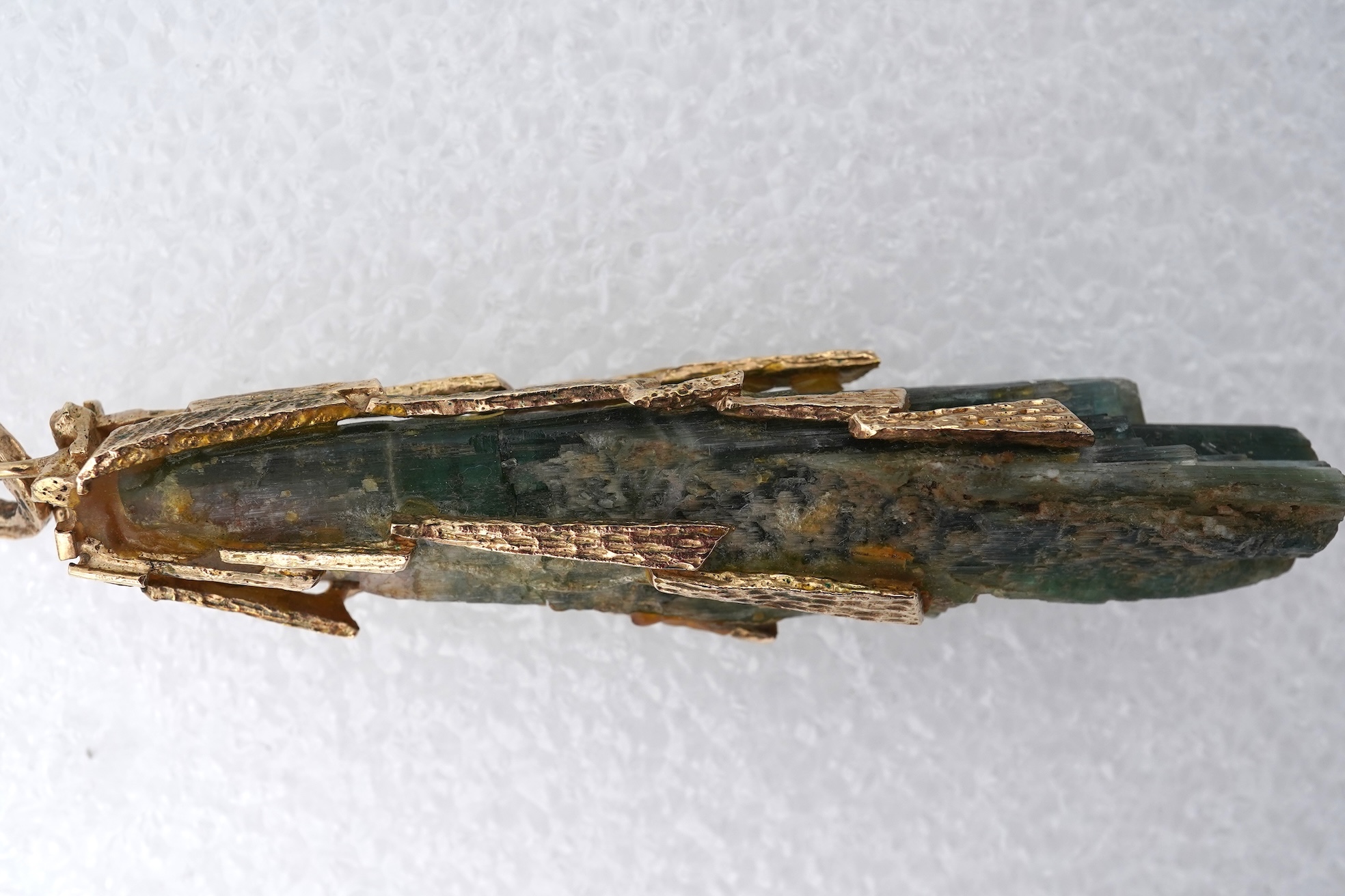 A gold and tourmaline crystal pendant, 1970s